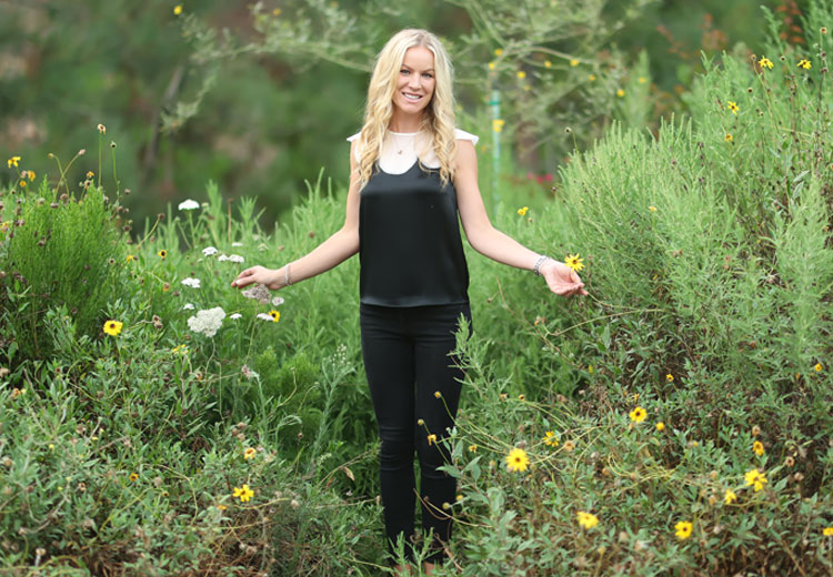 Julia Kay among wildflowers